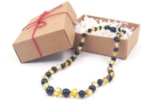 20251128_123018 "Day/night" amber necklace for kids
