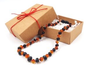 20260129_160333 Collar de ámbar para niños color coñac/cereza